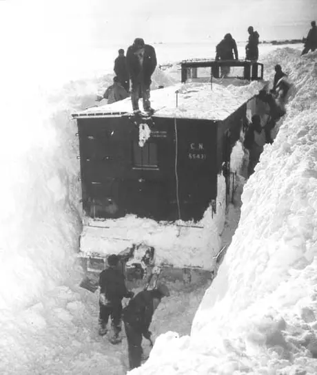 Digging out caboose No. 55341 after a snowstorm