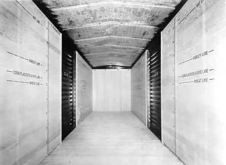 Interior view of boxcar No. 480221, showing load limits for various grains or cereals