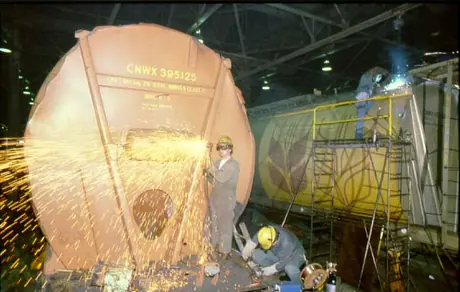 Repairing grain hopper cars at Transcona Shops