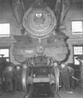 Shop crew moving driving wheels, Fort Rouge Shops
