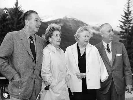 Animator Walt Disney (left) and friends visit a Jasper lodge