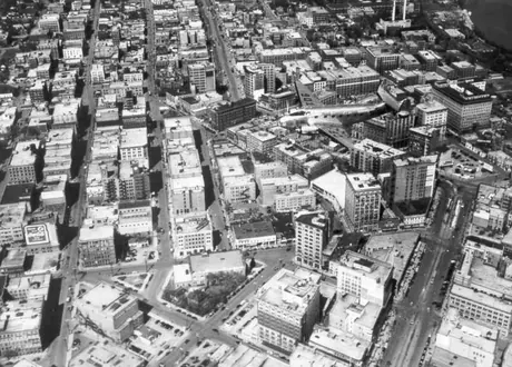 TCA Lodestar plane over city