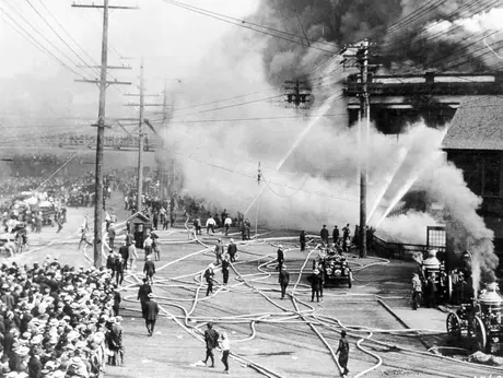 Fighting a fire at the Grand Trunk Pacific Steamship Company Seattle dock