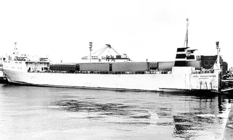Coastal ship MV Jarl Transporter loading trucks at the Halterm Terminal