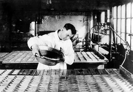 Pouring maple sugar into moulds