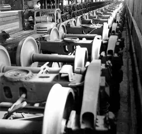 Standard and narrow gauge trucks in a transfer shed