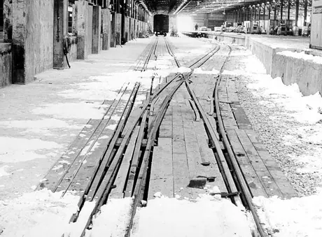 Standard and narrow gauge tracks run along the length of a terminal