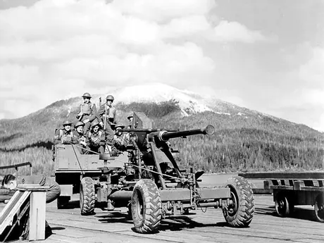 The anti-aircraft gun crew take up position at the Prince Rupert shipyard and dry dock