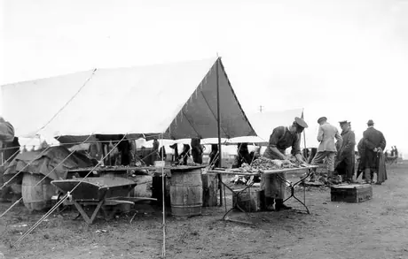 Preparing meat at a WWI training camp
