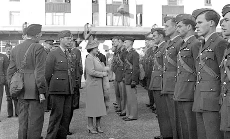 King George VI and Queen Elizabeth inspect volunteers from the US who have joined the Eagle Squadron
