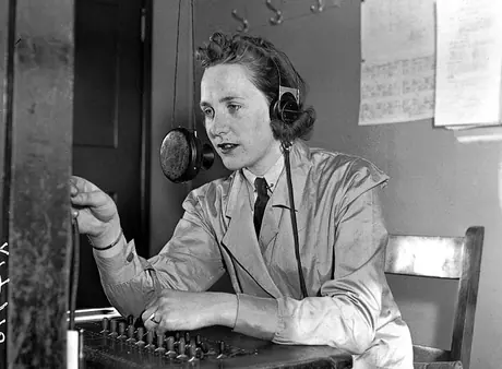 A telephone operator for the RCAF Women's Division connects a call