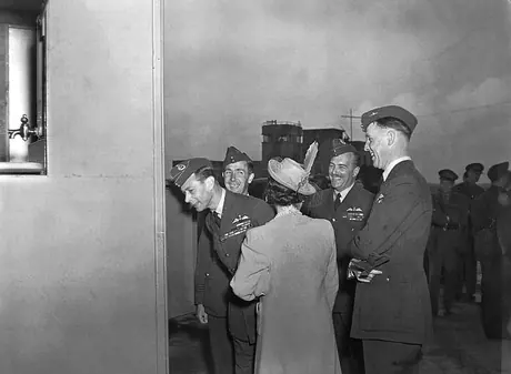 King George VI and Queen Elizabeth inspect a mobile canteen donated to an RCAF station