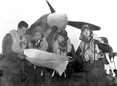 RCAF pilots double checking a course to ensure that there are no problems once they are in the air
