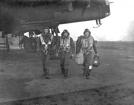 An RCAF crew returning from an operational flight over enemy territory