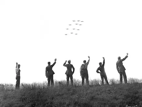 A Royal Canadian Air Force Fighter Squadron in squadron formation returns after executing manoeuvres