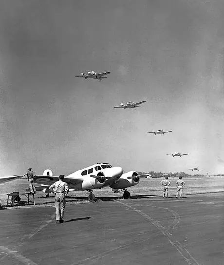 Cessnas form the line astern formation during a training exercise