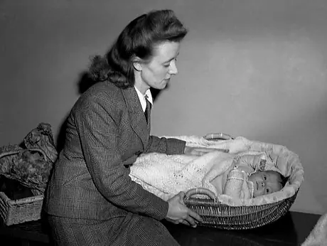 A war bride comforts her baby in Central Station