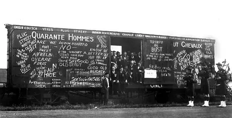 Members of the Royal Canadian Legion, Vimy Branch no. 27 in a box car they decorated at a reunion