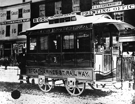 The first horse car of the St. Catharines Street Railway and an original fare token
