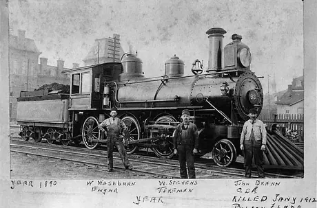 Central Vermont Railway coal burning steam locomotive no. 98 and CVR employees