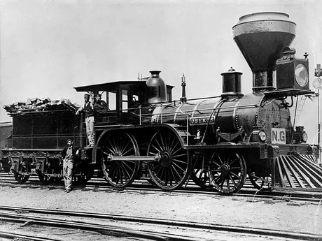 Great Western Railways steam locomotive Oberon with an NG sign as it was hauling cars of mixed gauge