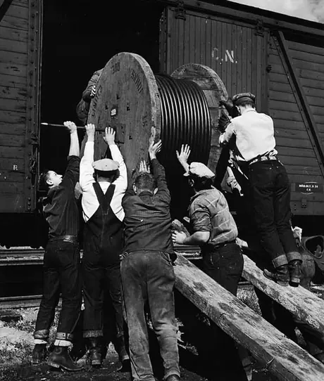 Loading a 500 foot reel of 2-inch diameter signal cable