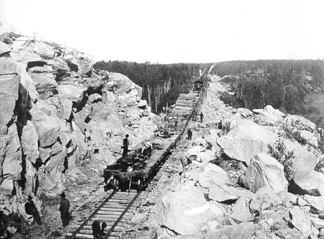 Grand Trunk Pacific Railway tie train installing ties 117 miles east of Winnipeg