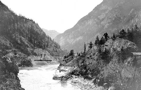 Grand Trunk Pacific Railway Company aerial trolley carrying rails over a canyon