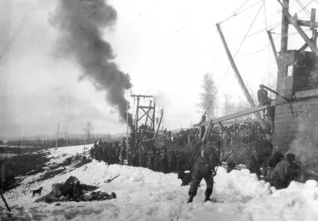 Tracklayer from east arrives at mile 1372.7 to complete Grand Trunk Pacific Railway line