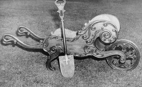 Wheelbarrow and spade used in Turning of First Sod ceremony for European and North American Railway by Lieutenant Governor and Lady Head