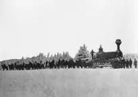 European and North American Railway steam locomotive Hercules - first locomotive in New Brunswick, being towed on a bobsled to shops for final assembly