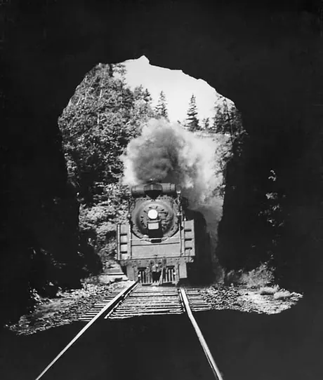 Canadian National Railways passenger train Ocean Limited enters the Morrissey Rock Tunnel