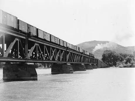 A Canadian National Railways freight train crosses a bridge