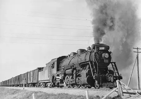 Canadian National Railways steam locomotive no. 3286 hauls a shipment of grain near the head of the Great Lakes