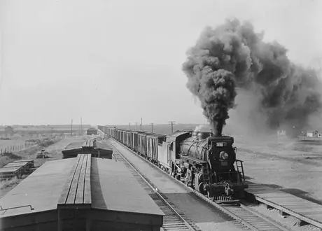 A grain shipment approaching the head of the Great Lakes hauled by Canadian National Railways steam locomotive no. 3286
