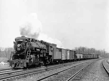 Canadian National Railways steam locomotive no. 3380 hauls a freight train near Toronto