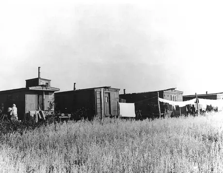 Bunk houses converted from old railway cars to accommodate recent immigrants from Sudetanland