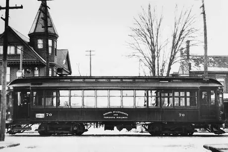 Niagara, St. Catharines and Toronto Railway electric interurban passenger car no. 70 travels through an intersection