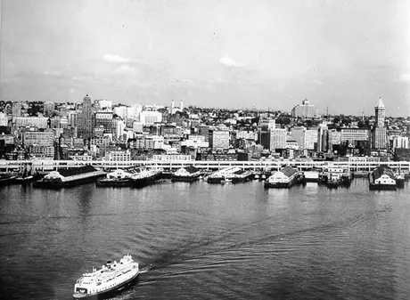 A ferry leaves the Seattle harbour front at Elliott Bay