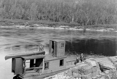 A river boat beside the dock