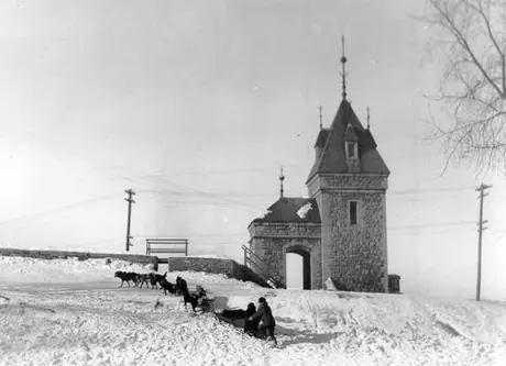 A dog sled and team at Kent Gate leading to the old walled city of Québec