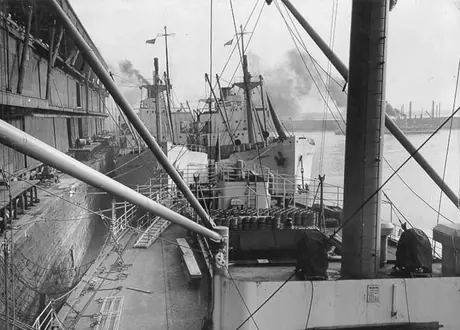 Ships tied up along the dock