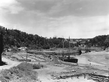 Loading lumber onto a boat