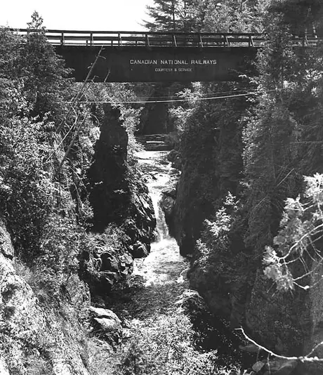 A railway bridge across the Pokiok River