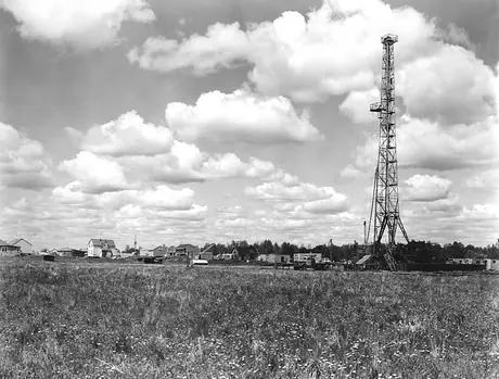 Town development near an oil drilling rig