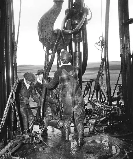 Oil workers at Canner no. 1 oil rig on the Vermillion oil fields