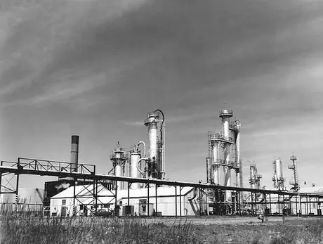 Equipment and office building near the entrance to the Edmonton Oil Refinery