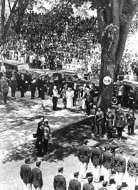 A party assembled at the Legislative Building includes King George VI and Queen Elizabeth during the 1939 Royal Tour of Canada