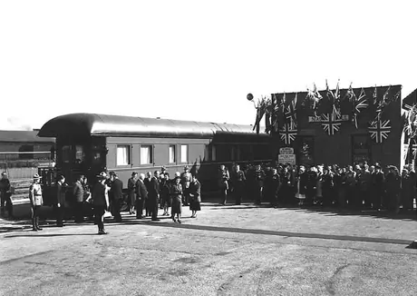 Princess Elizabeth and the Duke of Edinburgh disembark from the Royal Tour train at the Niagara Falls railway station during the 1951 coast-to-coast Tour of Canada