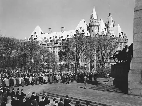 Princess Elizabeth and the Duke of Edinburgh review an honour guard of Veterans at the Naitonal War Memorial during the 1951 coast-to-coast Royal Tour of Canada